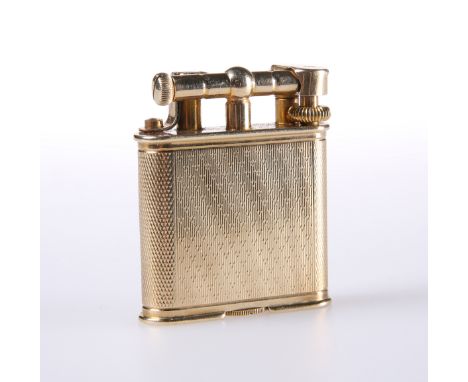 AN ALFRED DUNHILL 9 CARAT GOLD LIGHTER, LONDON 1932, the engine-turned case with rounded ends, signed Dunhill, nicely struck 