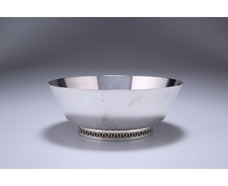 GEORG JENSEN, A STERLING SILVER BOWL DESIGNED BY SIGVAR BERNADOTTE, c.1950, circular, the foot with applied wavy band, model 