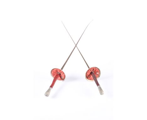 TWO FENCING FOILS, the first signed Paul and Wilkinson Sword, the second signed Leon Paul. 108cm