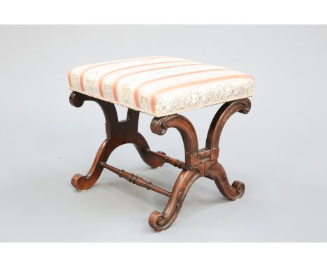 A REGENCY ROSEWOOD STOOL, the square upholstered seat raised on a a trestle type base with shaped X-form ends.