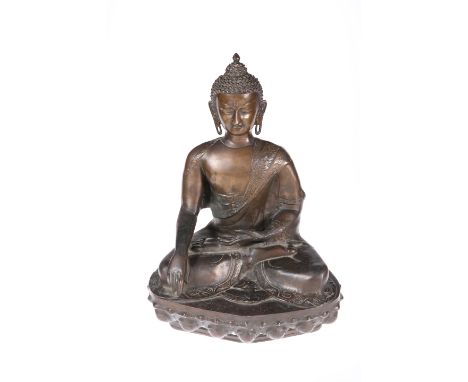 A LARGE CHINESE BRONZE FIGURE OF BUDDHA SHAKYAMUNI,&nbsp;seated in dhyanasana wearing flowing robes incised with foliate desi