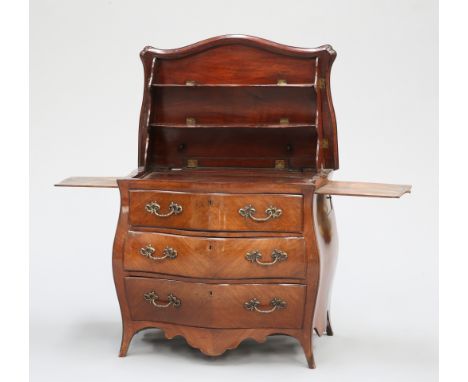 A LOUIS XVI MAHOGANY AND WALNUT BOMBE COMMODE, 18TH CENTURY, the hinged serpentine top opening to reveal fold out shelves, ab