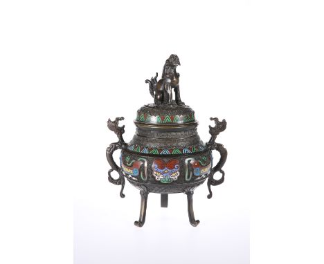 A CHINESE CHAMPLEVE ENAMEL BRONZE TRIPOD CENSER, 19TH CENTURY,&nbsp;the pierced and domed cover with shishi finial, the bulbo