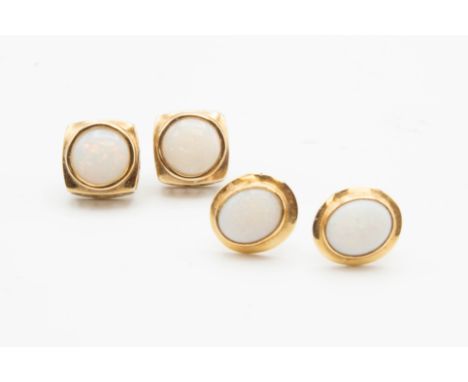 A PAIR OF 9CT YELLOW GOLD AND OPAL STUD EARRINGS, set with round cut opals, stamped 375; together with a further pair of opal