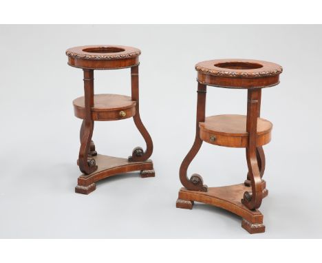 A PAIR OF 19TH CENTURY MAHOGANY WASHSTANDS, PROBABLY IRISH, circular, the tops with egg and dart moulded edge above a frieze 