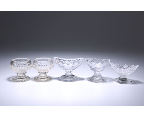 FIVE GEORGE III AND LATER CUT-GLASS SALTS, comprising a pair of circular salts, oval salt with "lemon squeezer" base, oval wi
