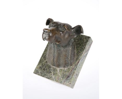A BRONZE MODEL OF A HOUND'S HEAD MOUNTED ON MARBLE, modelled with ears pricked, unsigned, the marble with brass hanger. Heigh