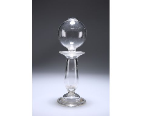 A LACE MAKER'S GLASS LAMP, 18TH/19TH CENTURY, with folded foot and baluster stem. 25cmGood condition
