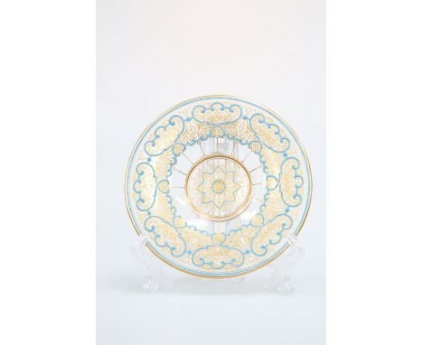 A VENETIAN ENAMEL AND GILT PAINTED DISH, MURANO, LATE 19th CENTURY, circular, the deep well and broad rim enamel painted in t
