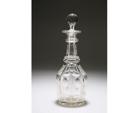 A CUT-GLASS BARREL-SHAPED DECANTER, with faceted ball stopper over a panel-cut neck with top ring and double collar rings, ov