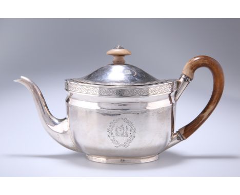 A GEORGE III SILVER TEAPOT, JOHN EMES, LONDON 1803, oval, with a band of bright-cut geometric decoration, engraved with a cre