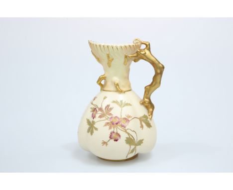 A ROYAL WORCESTER BLUSH IVORY JUG, 1891, with gilded coral-moulded handle, decorated with foliage, no. 1507, puce printed fac