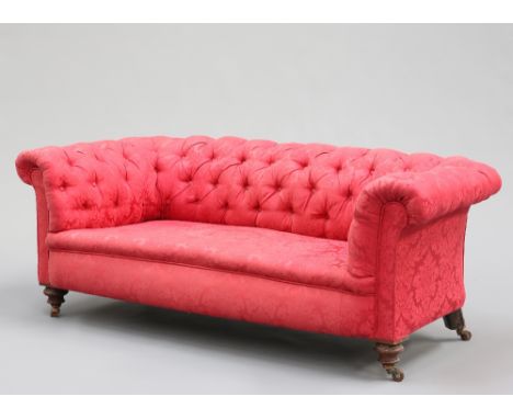 A VICTORIAN BUTTON-BACK CHESTERFIELD SOFA, raised on turned legs and moving on castors. 176cm long