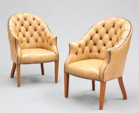 A HANDSOME PAIR OF BUTTON-BACK LEATHER LIBRARY CHAIRS, upholstered in light brown leather, raised on square-section tapering 