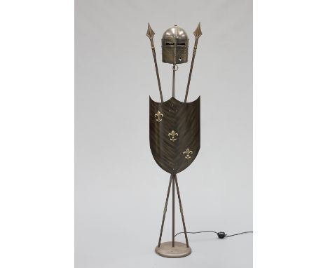 A NOVELTY "ARMOURED" METAL STANDARD LAMP, incorporating a decorative helmet, crossed spears and curved shield. 179cm high