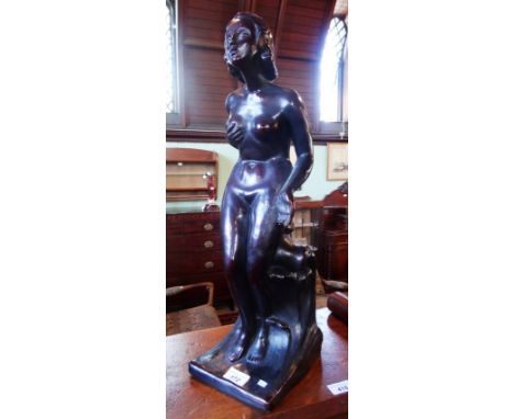 An imposing Art Deco ceramic figure of nude lady on shaped rectangular base, indistinctly signed, 55cm.