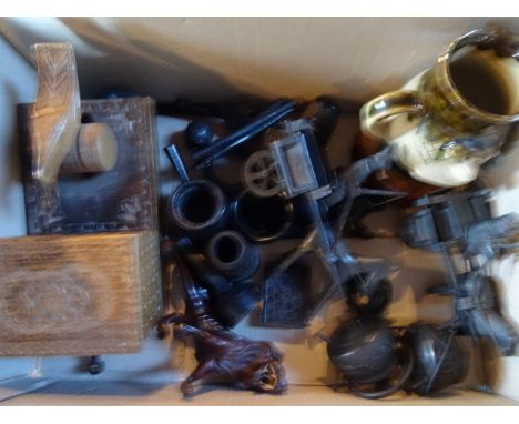 A quantity of carved Irish bogwood items, together with a novelty continental cigarette dispenser, other items of treen and a