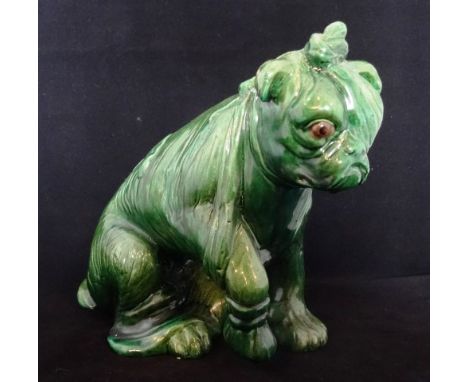 An early 20th century Bretby ceramic model of an injured bull dog, known as 'After The (Battle)', shape no. 1348, incised mar