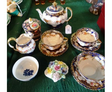 A mid-18th century Worcester porcelain tea bowl, decorated in underglaze blue, bearing blue crescent mark, together with a pa