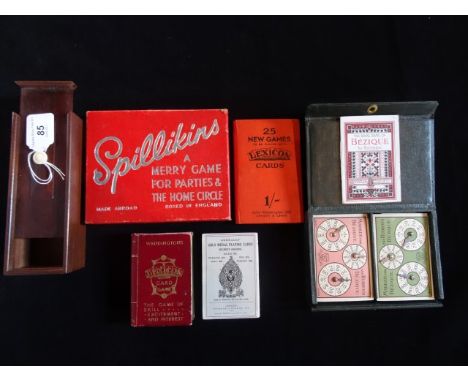 A quantity of early 20th century boxed parlour games, to include: Spillikins, Bezique and Lexicon by Waddingtons, together wi