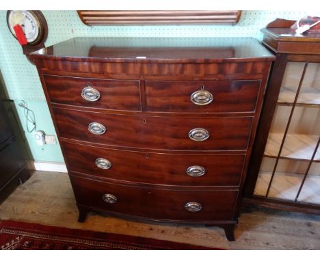 A Georgian bow front chest, having two short over three graduated long drawers on splayed bracket feet, 107cm wide.