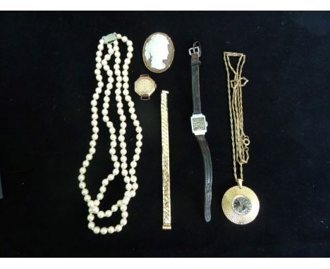 A lady's Accurist watch in yellow metal case, together with a lady's contemporary fob watch on chain, a lady's Art Deco-style