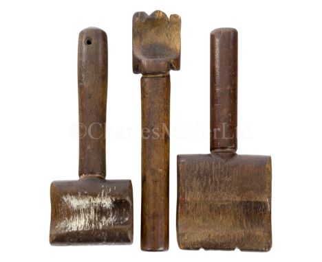 A COLLECTION OF TREENcomprising three 19th Century serving mallets; a 30-second pulse timer with turned endpieces and old pap