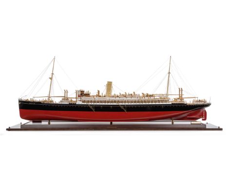 A FINELY DETAILED 1:96 SCALE BUILDER'S STYLE MODEL OF H.M.S. JERVIS BAY [1922]the laminated and carved 64in. hull with bilge 