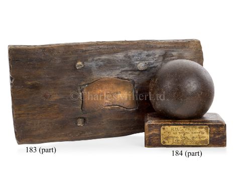 A 32LB CANNON BALL UNDERSTOOD TO BE FROM H.M.S. VICTORY6in. diameter cast iron ball mounted on oak display base with punched 