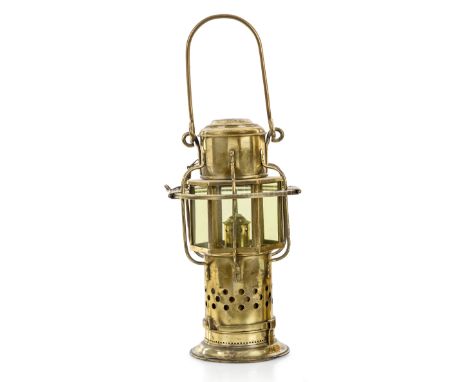 A 19TH CENTURY ROUND CARGO LAMP heavily constructed in brass with removable base to sprung candle socket, hexagonal glazed wi