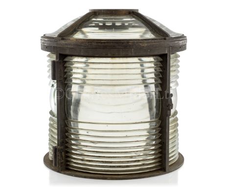 A 4TH ORDER FRESNEL LAMP HOUSING, POSSIBLY FRENCH, CIRCA 1880heavily constructed in bronze, indistinctly stamped CB4 and numb