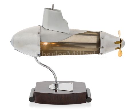 A NOVELTY DESK LAMP, CIRCA 1950modelled in steel as a stylised submarine with brass propeller, attached to a wooden base with