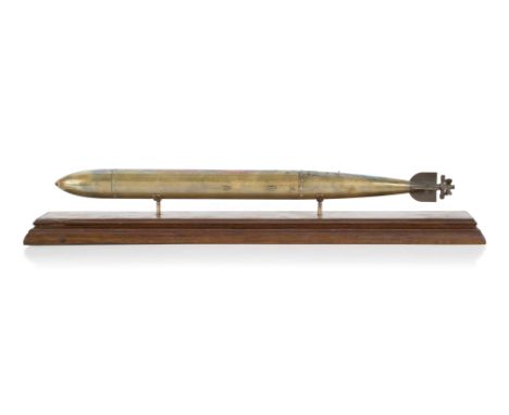 A BRASS DESK MODEL FOR AN EARLY TORPEDO, POSSIBLY WHITEHEAD, CIRCA 1884constructed in four sections with guiding fins and two