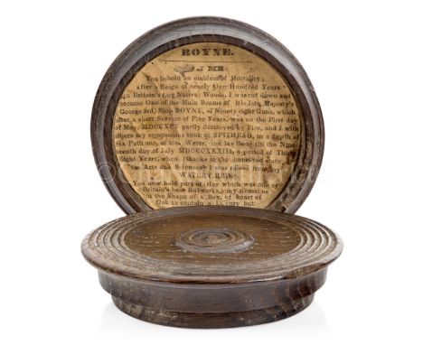A BLACK OAK SNUFF BOX MADE FROM TIMBER RECOVERED FROM H.M.S. BOYNE, SUNK 1795, RAISED 1833turned lid and base, the lid with p
