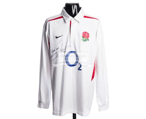 Jonny Wilkinson signed England replica 2003 Grand Slam season rugby shirt,signed in black marker pen