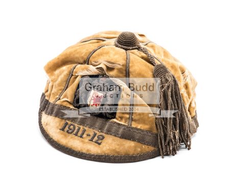 Cardiff Rugby Football Club cap 1911-1912,yellow velvet with silver thread and trim with tassel embroidered with Cardiff Rugb