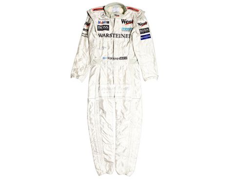 Mika Hakkinen signed and worn late 1999 West McLaren-Mercedes Formula 1 racesuit,his 'Flying Finn' signature by marker pen on