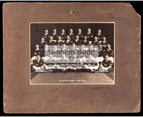 A signed official photograph of the 1930 British [Lions] Rugby Team,a mounted 8 by 11in. team-group photograph applied with a