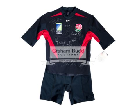 Rare & signed England 2003 Rugby World Cup dark blue colour change kit,comprising a short-sleeved shirt and a pair of shorts,