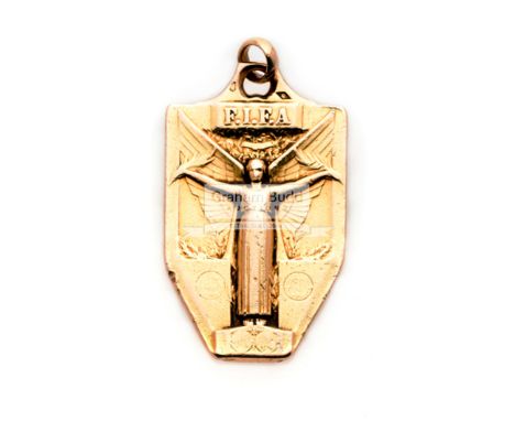 A medal presented by the French Football Association to Maurice Fischer a member of the FIFA Organising Committee for the 193