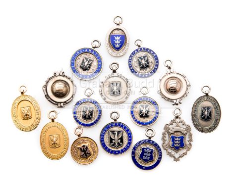 A group of 15 East Riding Football Association medals,three struck in 9ct. gold for Senior Cup runners-up 1931-32 & Country C