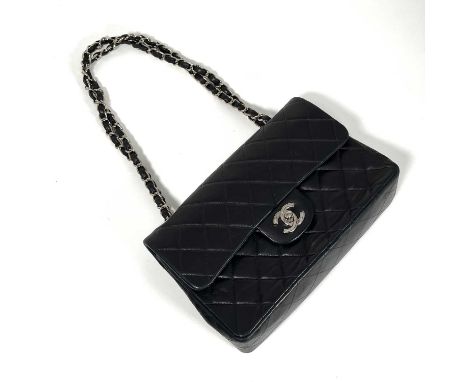 A Chanel Classic double flap bag, quilted lambskin exterior with rear slip pocket, chain and leather intertwined shoulder str
