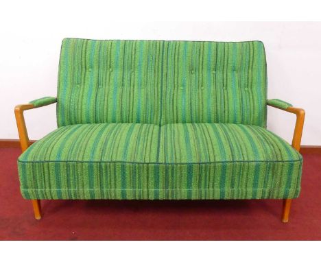 A circa 1960 Swedish DUX corduroy green fabric buttonback upholstered two-seater sofa, raised on stained beech end supports, 