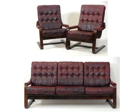 A 1960s Scandinavian formed laminate cantilever framed three-piece suite, comprising a three-seater sofa, w.187cm, and a matc