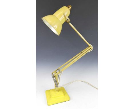 Herbert Terry - a yellow painted metal anglepoise lamp, model No.1227, of hinged and rotating form with removable shade, rais