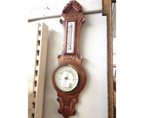 CARVED OAK BAROMETER 60CM     R