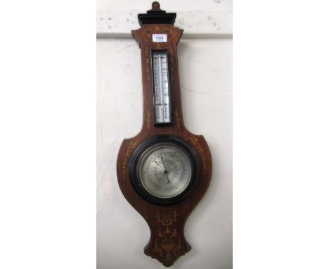 Marquetry inlaid aneroid barometer and a reproduction walnut three train mantel clock 