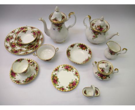 Large collection of Royal Albert Old Country Rose tea, coffee and dinnerware, including teapot, coffee pot, serving plates, s