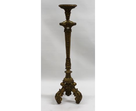 Early 20th Century carved and gilded torchere in antique style, with tripod base, 134cm high (small missing section at the sh