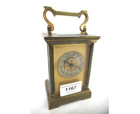 20th Century brass cased carriage clock, having circular silvered dial with Arabic numerals, including key 